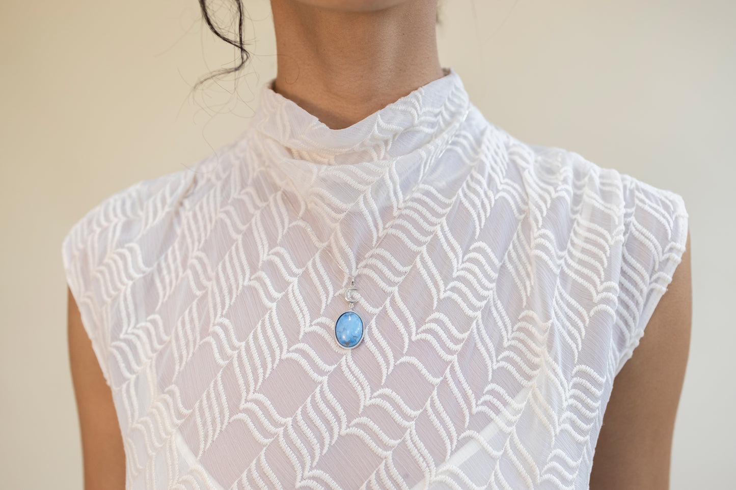 Dije luna nutricia con turquesa