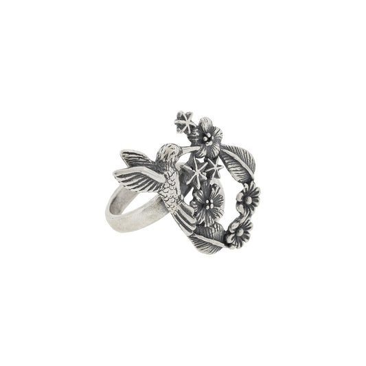 Anillo clásico de colibrí con flores y estrellas