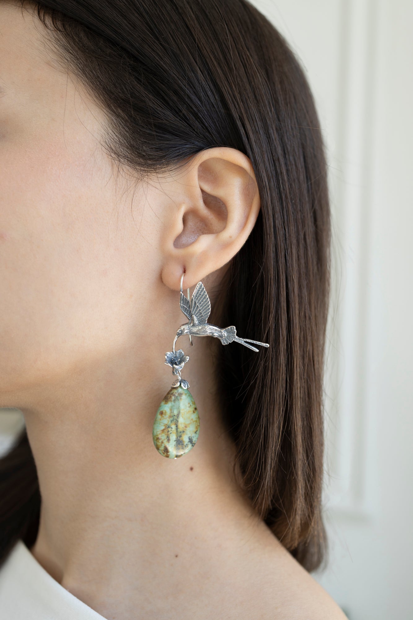 Aretes colibrí colas